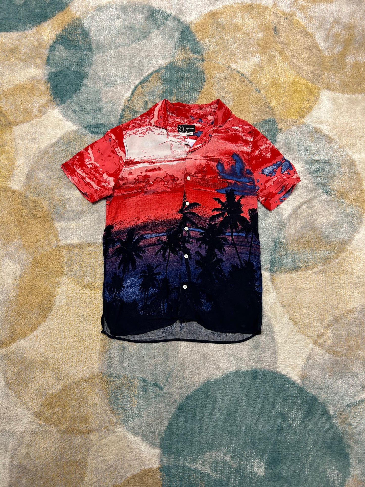 Red and blue sunset patterned shirt