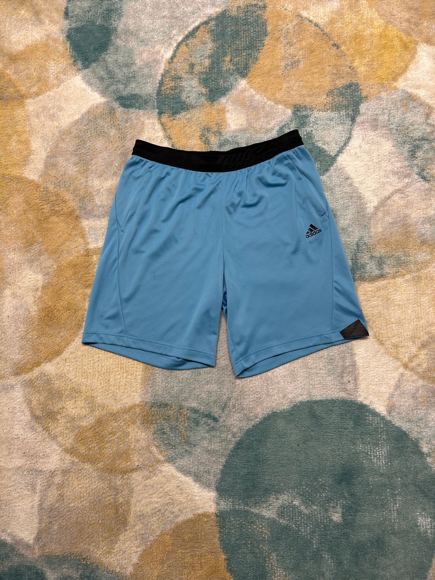 Adidas light blue and black shorts
