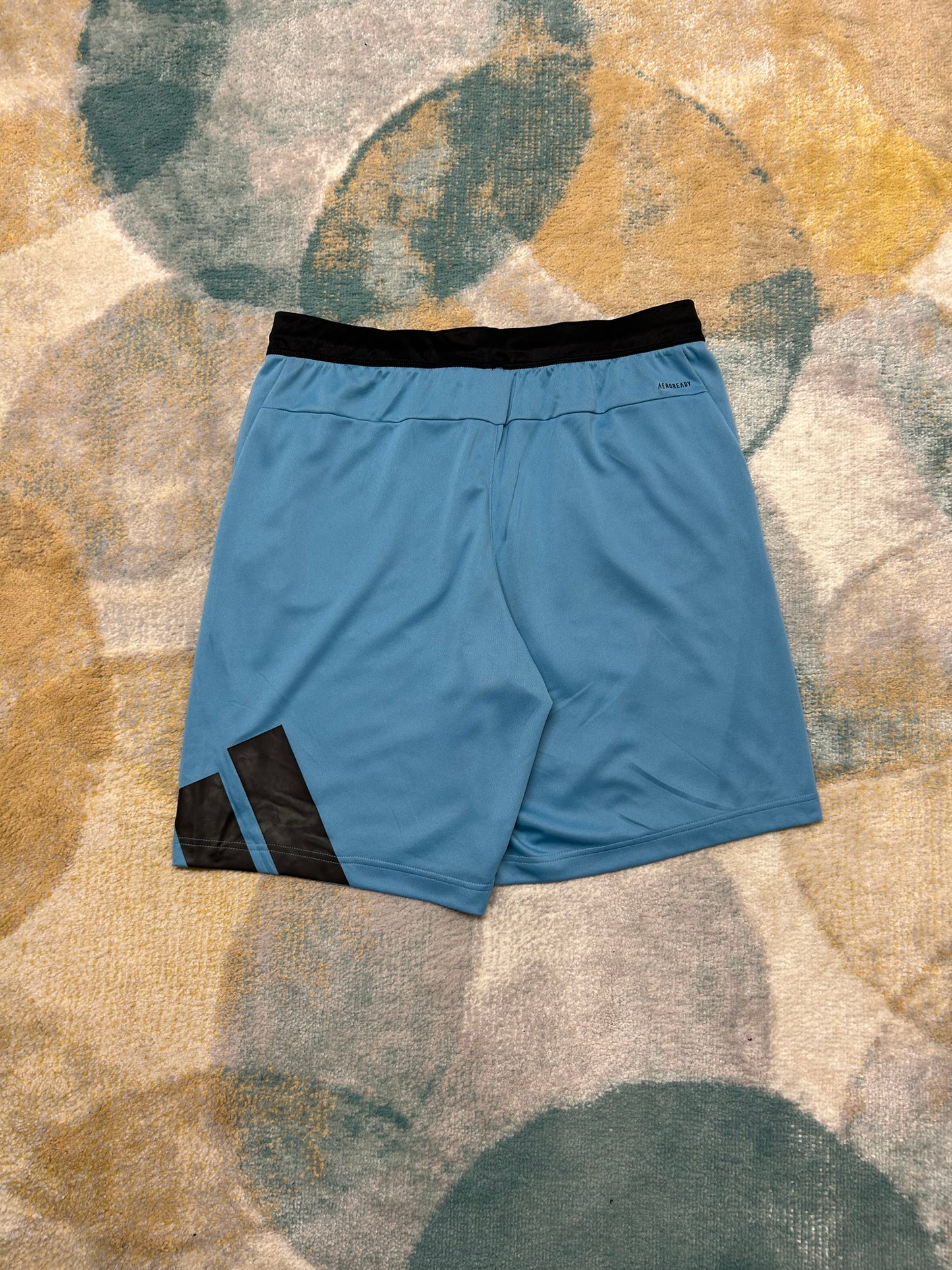 Adidas light blue and black shorts
