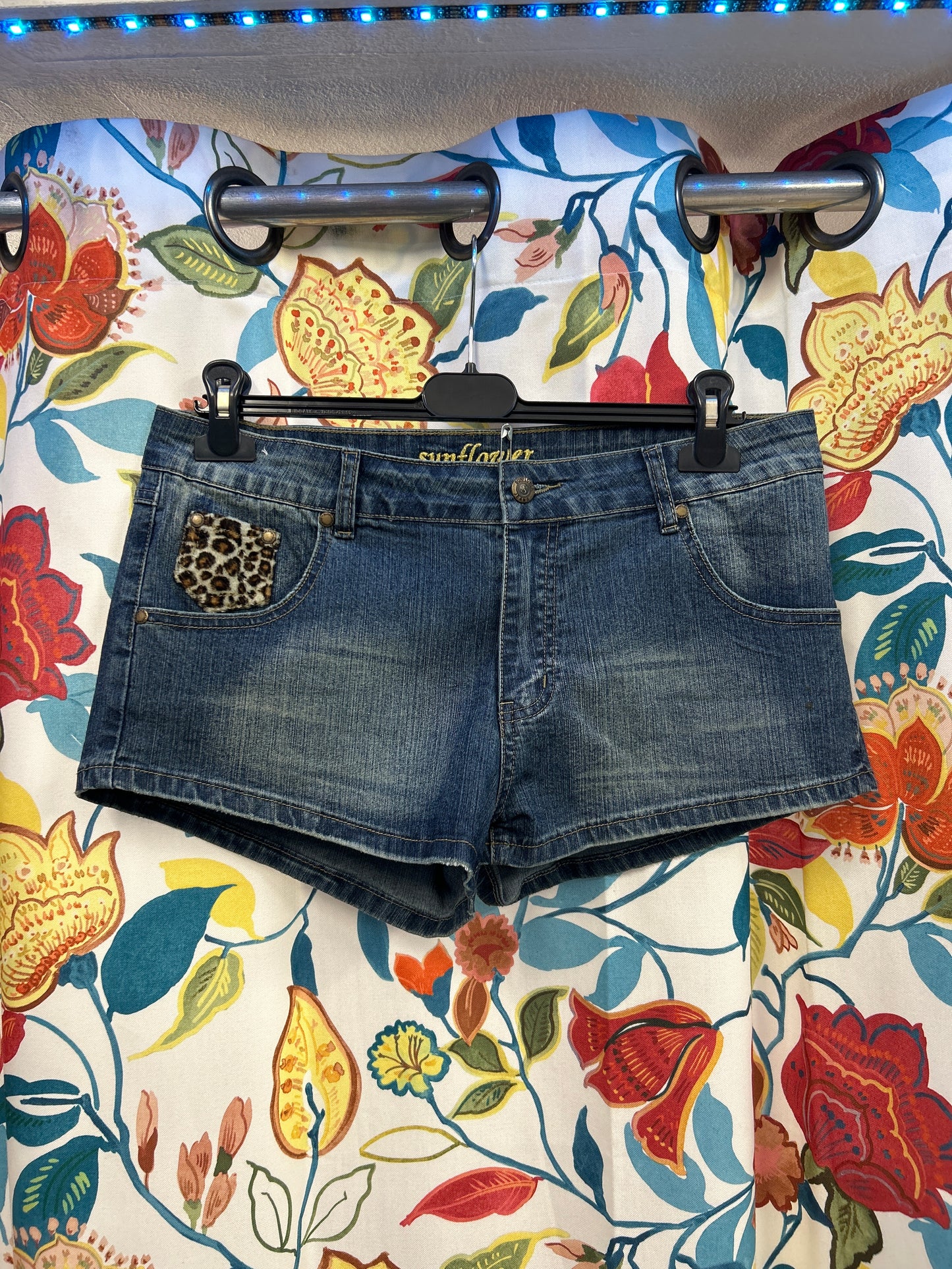 Y2K denim shorts with leopard details