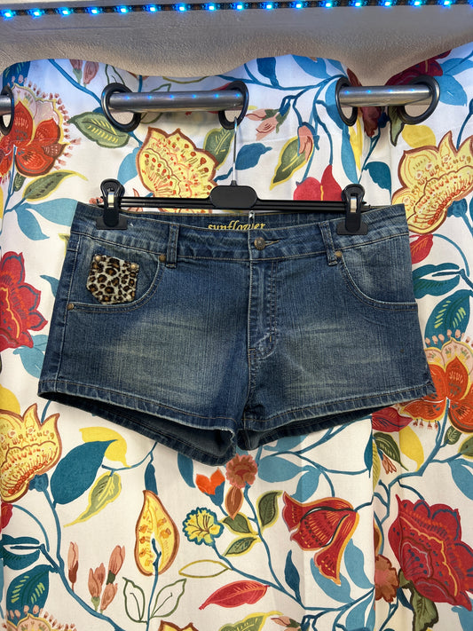 Y2K denim shorts with leopard details