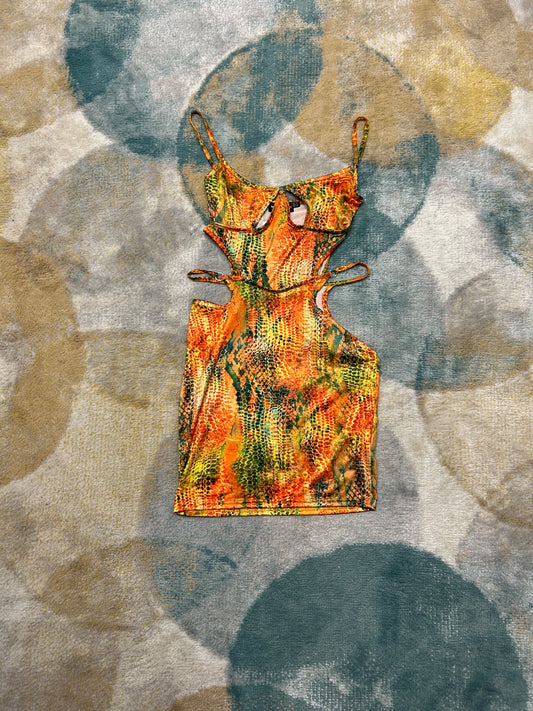 Modern cut orange and green pattern dress
