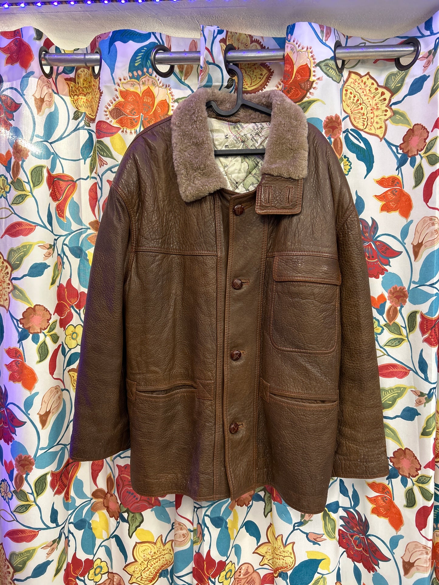 Dark brown heavy 100% leather jacket with map of America inside