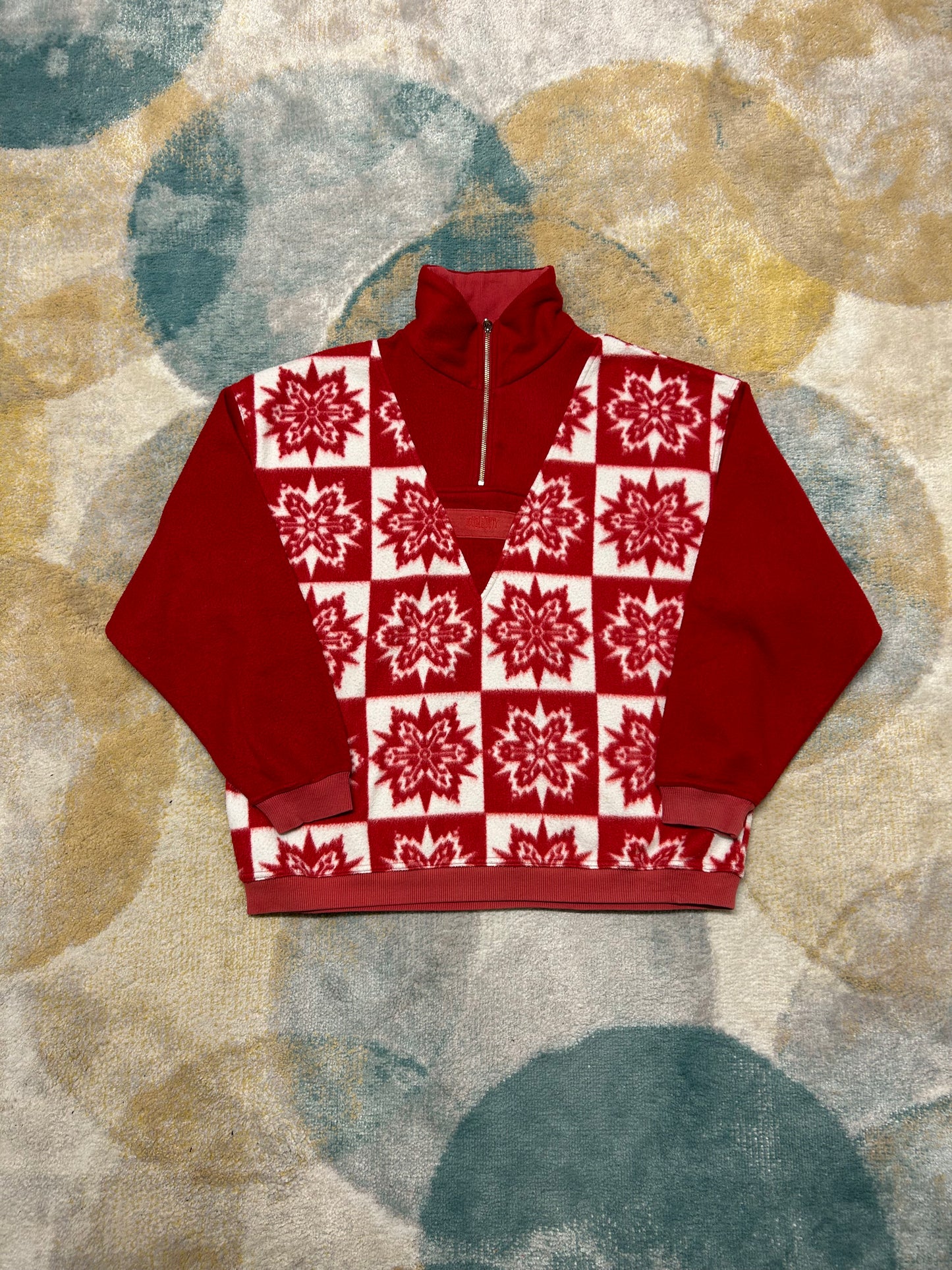 Retro red and white snowflake patterned fleece half-zip